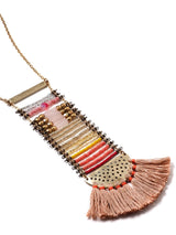 close up view of a beaded ladder necklace in antique gold with tassels