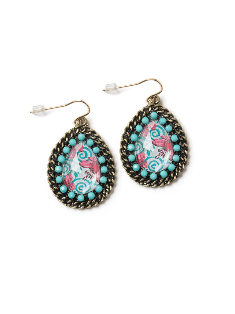 front view of a pair of teardrop shaped earrings with paisley graphic inserts and blue cabochon surround