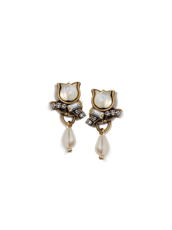 top down view of sparkling earrings with glass tulips and pearls