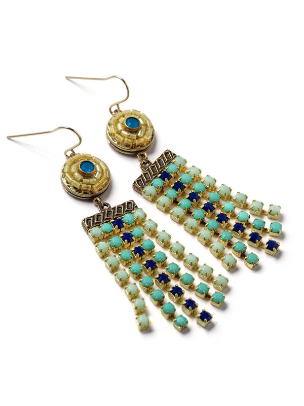 side view of colorful fringe earrings with beaded tops and blue centers